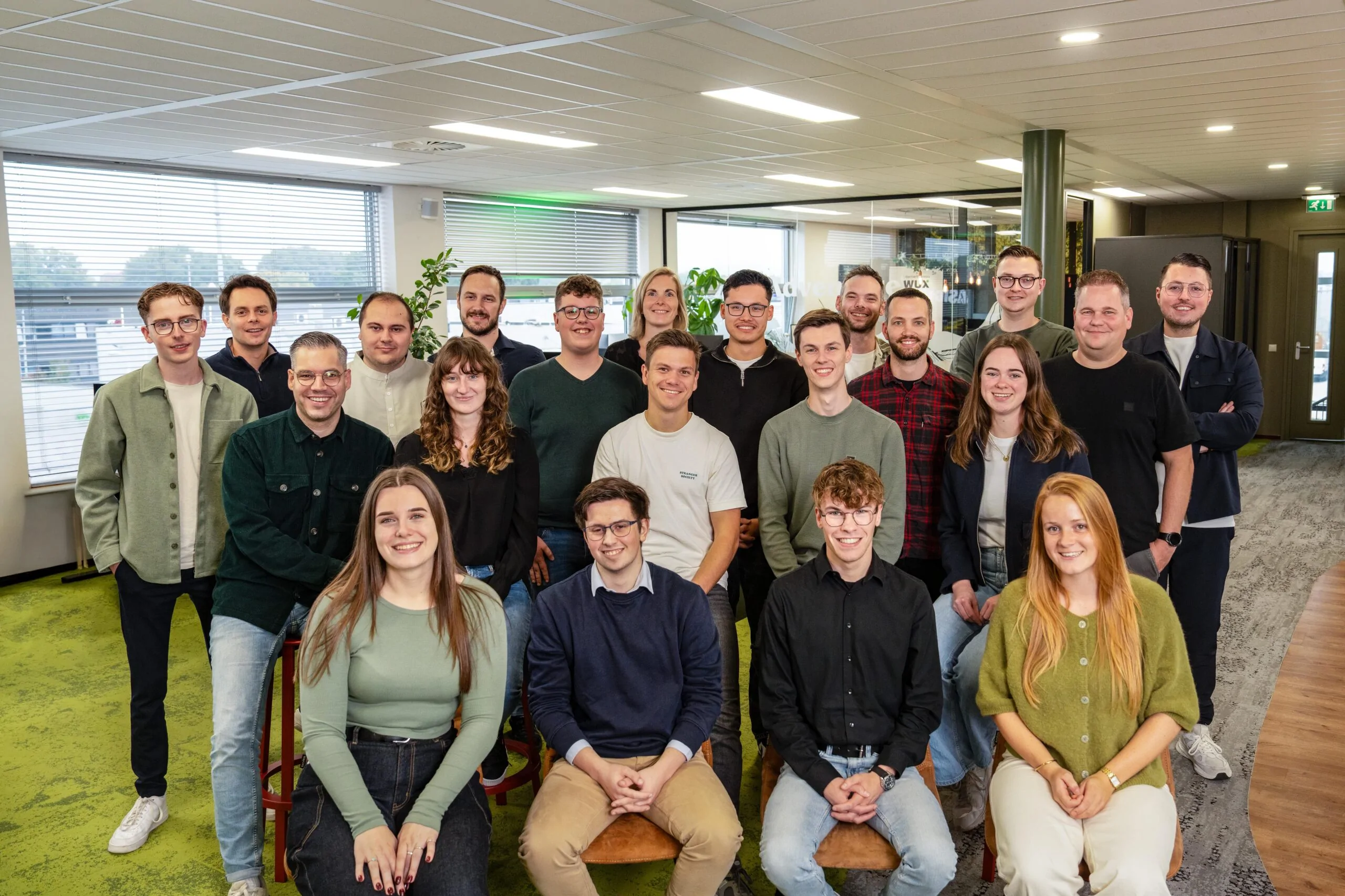 Groepsfoto van alle medewerkers van Wux