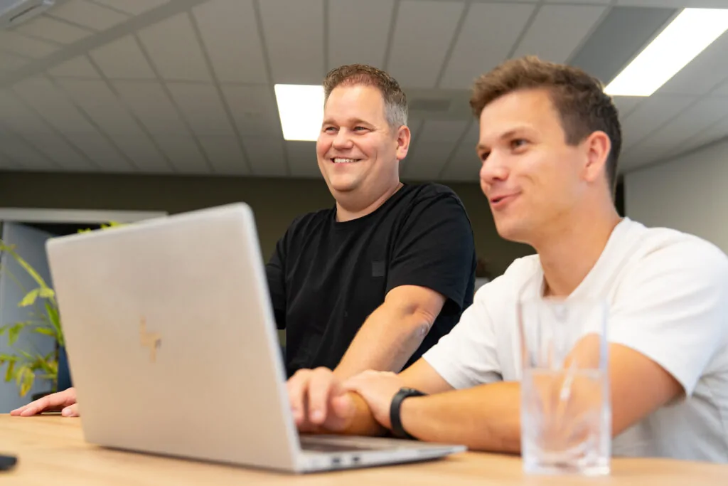 Adviesgesprek over AI op maat met expert van Wux