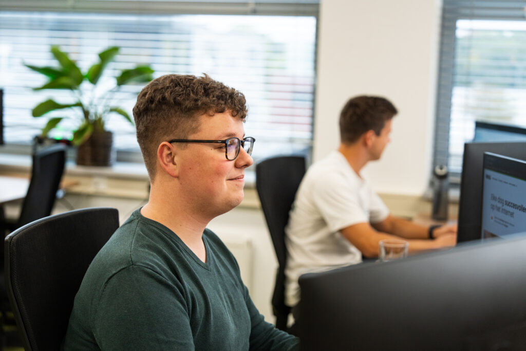 Designer van Wux werkt aan wireframing & prototyping